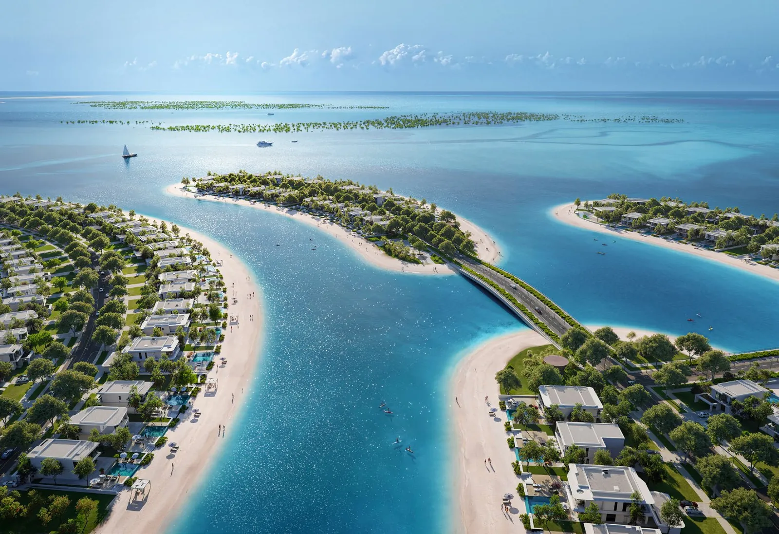 Aerial view of Ramhan Island: sandbanks and turquoise lagoons, villas among the trees and a bridge to the mainland